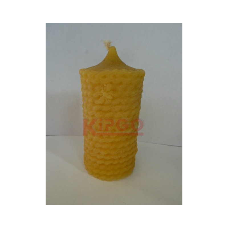 Honeycomb candle with bees